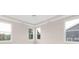 Bright bedroom with multiple windows providing natural light and views of the outdoors at 1074 Wylie Falls Ln, York, SC 29745