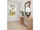 Entryway features a wooden mirror, lamp, and a view of the front yard through the front door at 1074 Wylie Falls Ln, York, SC 29745