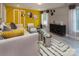 Bright living room features stylish decor, plush seating, and modern lighting at 1074 Wylie Falls Ln, York, SC 29745