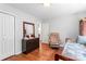 Bedroom featuring hardwood floors, closet, an armchair, and lots of natural light at 1109 Sunnyview Cir, Matthews, NC 28105
