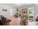 Comfortable living room with hardwood floors, natural light, and elegant furnishings at 1109 Sunnyview Cir, Matthews, NC 28105