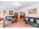 Spacious living room with hardwood floors, comfortable seating, and classic decor at 1109 Sunnyview Cir, Matthews, NC 28105