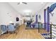Open concept living room with hardwood floors and modern decor, flowing into kitchen area at 1113 Greenleaf Ave # A, Charlotte, NC 28202