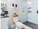 Bright bathroom featuring a glass shower with gray tile floor, and modern fixtures at 1113 Greenleaf Ave # B, Charlotte, NC 28202