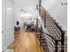 Open floor plan featuring a staircase, living room, dining area, and kitchen at 1113 Greenleaf Ave # B, Charlotte, NC 28202