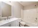 Bathroom featuring modern vanity, framed mirror, tub and shower combo and gray wood-look flooring at 11531 Delores Ferguson Ln, Charlotte, NC 28277