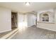 Open living room shows the stairs, kitchen and front door at 11531 Delores Ferguson Ln, Charlotte, NC 28277