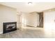 Open-concept living room displaying fireplace and staircase at 11531 Delores Ferguson Ln, Charlotte, NC 28277