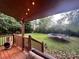 Relaxing backyard view from the deck, showcasing the spacious lawn and a fun trampoline at 1344 Moonshadow Ln, Shelby, NC 28150