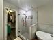 The bathroom showcases a glass enclosed shower and walk in closet that combines style with functionality at 1344 Moonshadow Ln, Shelby, NC 28150