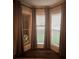 Bay window with blinds and neutral curtains at 1344 Moonshadow Ln, Shelby, NC 28150