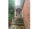 Welcoming front porch with decorative wreath and steps leading to the home's entrance at 1344 Moonshadow Ln, Shelby, NC 28150