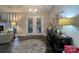 Living room with a fireplace and door to outside at 1344 Moonshadow Ln, Shelby, NC 28150