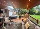 Relax under string lights on the covered patio with a hot tub, hammock, and cozy seating at 1344 Moonshadow Ln, Shelby, NC 28150