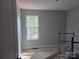 Bedroom featuring a window at 153 Brook Creek Dr, Troutman, NC 28166