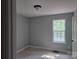 Bedroom features a window at 153 Brook Creek Dr, Troutman, NC 28166