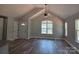 Spacious living room with vaulted ceilings and large windows at 153 Brook Creek Dr, Troutman, NC 28166