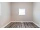 Bedroom featuring a window and wood-look flooring at 1818 Stowe Ave, Gastonia, NC 28054