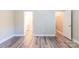 Bright bedroom with modern flooring and access to bathroom and walk-in closet at 1818 Stowe Ave, Gastonia, NC 28054
