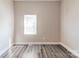 Bedroom with a window provides natural light and views at 1818 Stowe Ave, Gastonia, NC 28054