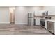 Bright and spacious kitchen featuring stainless steel appliances and ample counter space at 1818 Stowe Ave, Gastonia, NC 28054