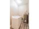 A functional laundry room with a washer, dryer, and water heater at 1818 Stowe Ave, Gastonia, NC 28054