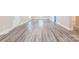 Spacious living room with modern flooring, neutral paint, and bright natural light at 1818 Stowe Ave, Gastonia, NC 28054