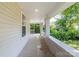 Spacious covered porch with brick accents, offering a relaxing outdoor space at 1818 Stowe Ave, Gastonia, NC 28054