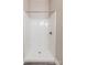 White stand up shower with a shower head at 1818 Stowe Ave, Gastonia, NC 28054