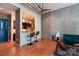 Open floor plan with exposed ductwork, bar seating, and a view into the modern kitchen area at 2116 Mcclintock Rd # 122, Charlotte, NC 28205