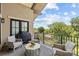 Inviting balcony featuring comfortable seating and a beautiful view at 2312 Selwyn Ave # 502, Charlotte, NC 28207