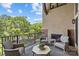Relaxing balcony with comfortable seating and a fireplace at 2312 Selwyn Ave # 502, Charlotte, NC 28207