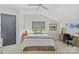 Cozy bedroom with a neutral palette, ceiling fan, and a bright window at 2312 Selwyn Ave # 502, Charlotte, NC 28207