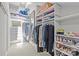 Spacious walk-in closet with custom shelving and ample storage at 2312 Selwyn Ave # 502, Charlotte, NC 28207