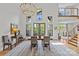 Elegant dining room with high ceilings, large windows, and sophisticated decor at 2312 Selwyn Ave # 502, Charlotte, NC 28207