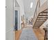 Bright, open foyer with a modern staircase and stylish decor at 2312 Selwyn Ave # 502, Charlotte, NC 28207