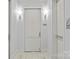 Well-lit hallway with crisp, clean aesthetic, and unit signage at 2312 Selwyn Ave # 502, Charlotte, NC 28207