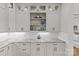 Elegant kitchen with custom cabinets, granite countertops and designer backsplash at 2312 Selwyn Ave # 502, Charlotte, NC 28207