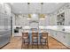 Stylish kitchen with stainless steel appliances, marble countertops, and a central island at 2312 Selwyn Ave # 502, Charlotte, NC 28207