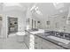 Spacious main bathroom with double vanity, large mirror, walk in shower, and natural lighting at 2312 Selwyn Ave # 502, Charlotte, NC 28207