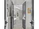 Bright main bathroom with double doors, stand alone tub, and glass enclosed shower at 2312 Selwyn Ave # 502, Charlotte, NC 28207
