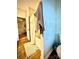 Bathroom featuring a shower with a curtain, a white bathmat, and wood-look flooring at 243 Kerri Dawn Ln, Locust, NC 28097