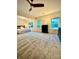Spacious main bedroom featuring natural light, large windows, carpet floors and a ceiling fan at 243 Kerri Dawn Ln, Locust, NC 28097