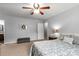 Cozy bedroom featuring natural light, ceiling fan, and neutral decor at 2460 Prince Dr, Lancaster, SC 29720