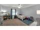 Bedroom featuring bright walls, a ceiling fan, and carpeted floor at 2460 Prince Dr, Lancaster, SC 29720