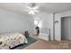 Bright bedroom featuring carpeted floors, a ceiling fan, and a desk at 2460 Prince Dr, Lancaster, SC 29720