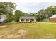 Charming single-story home featuring a well-maintained lawn and classic architectural details at 2460 Prince Dr, Lancaster, SC 29720