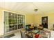 Covered patio with outdoor furniture, sliding glass door and a ceiling fan, ideal for relaxing and entertaining at 2460 Prince Dr, Lancaster, SC 29720