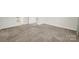 Empty bedroom with plush carpeting, neutral walls, and a view into the hallway at 2959 Bellasera Way, Matthews, NC 28105