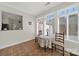 Sun-filled breakfast nook featuring a cozy table set, tiled floor, and natural light at 2959 Bellasera Way, Matthews, NC 28105